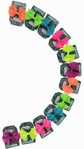 MOÑO DE LISTON ROXY NEON 9CM X 8CM (12 PZ)